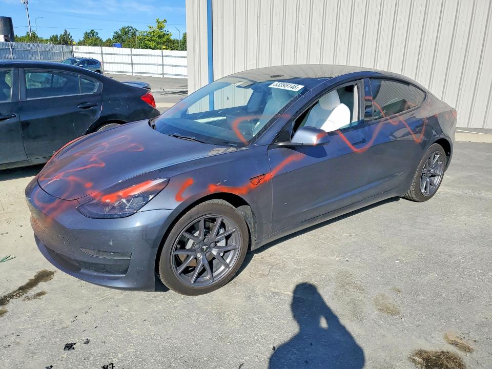 TESLA MODEL 3 2023 with VIN 5YJ3E1EA2PF550074 - Photo from auction