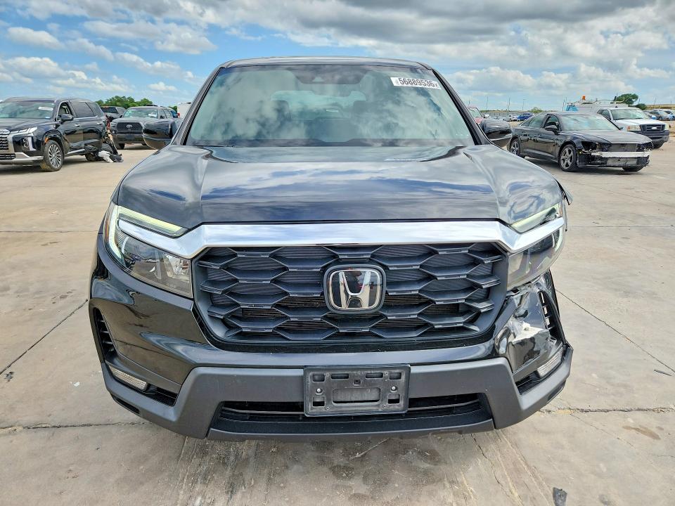 Photo 5 from auction – 2022 HONDA PASSPORT with VIN 5FNYF7H55NB006606