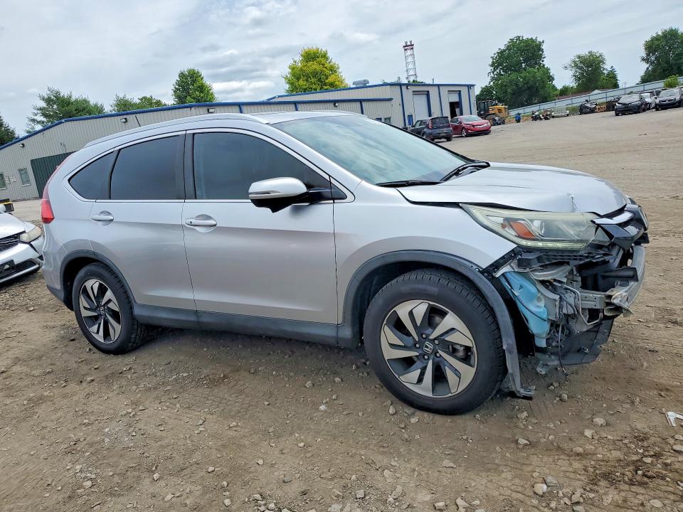 Photo 4 from auction – 2016 HONDA CR-V with VIN 5J6RM4H93GL061285