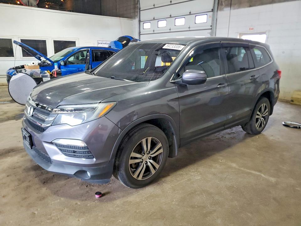 HONDA PILOT 2017 with VIN 5FNYF6H38HB069003 - Photo from auction