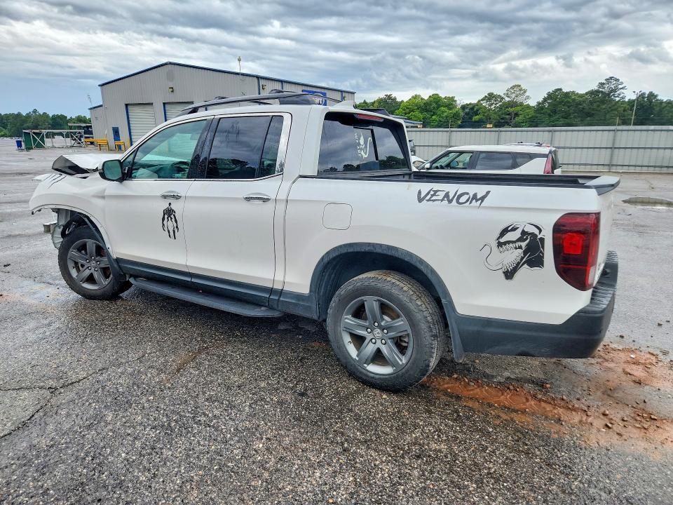 Photo 2 from auction – 2023 HONDA RIDGELINE with VIN 5FPYK3F70PB044859