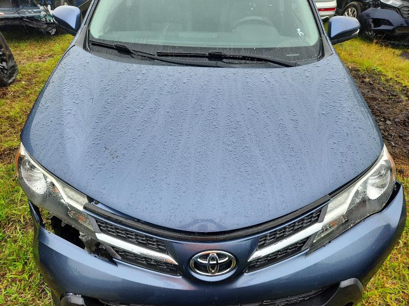 Photo 12 from auction – 2014 TOYOTA RAV4 with VIN JTMYFREV9ED033153