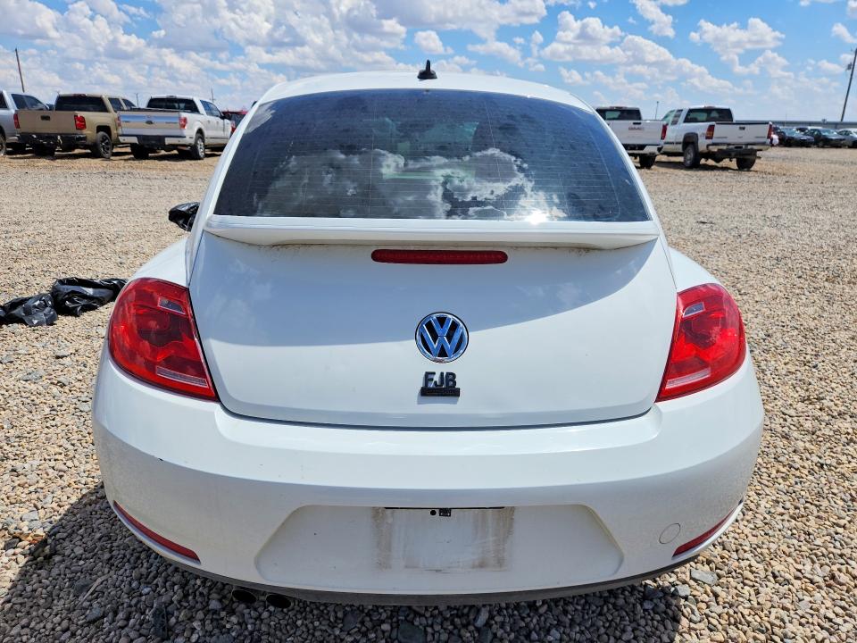 Photo 6 from auction – 2014 VOLKSWAGEN BEETLE with VIN 3VWRL7AT9EM654884