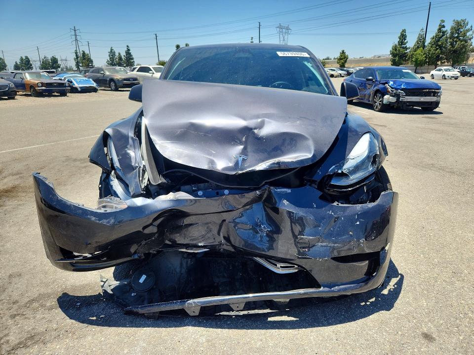 Photo 5 from auction – 2025 TESLA MODEL Y with VIN 7SAYGDED1SF321151
