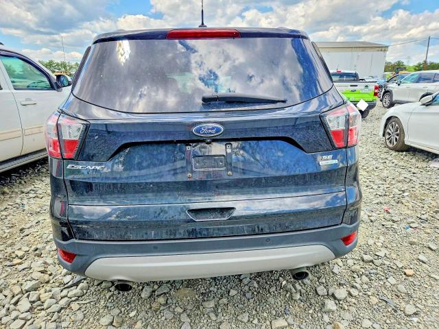Foto 6 de la subasta – 2017 FORD ESCAPE con VIN 1FMCU0GD1HUD74594