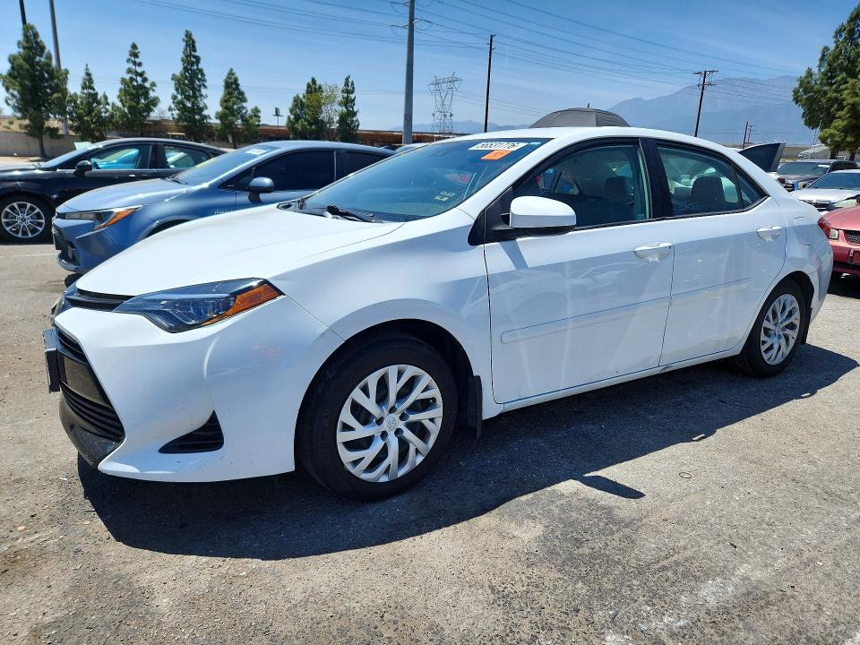 TOYOTA COROLLA 2018 with VIN 5YFBURHE0JP780378 - Photo from auction