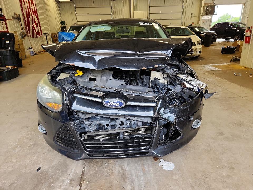 Photo 5 from auction – 2013 FORD FOCUS with VIN 1FADP3J25DL107571