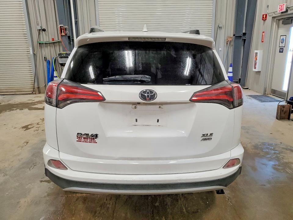 Photo 6 from auction – 2016 TOYOTA RAV4 with VIN 2T3RFREVXGW443843