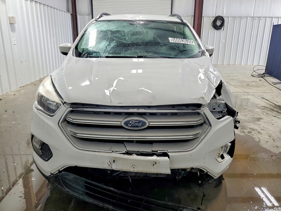 Photo 5 from auction – 2018 FORD ESCAPE with VIN 1FMCU9GD9JUD36847