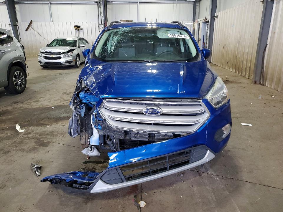 Photo 5 from auction – 2018 FORD ESCAPE with VIN 1FMCU9GD0JUA32046