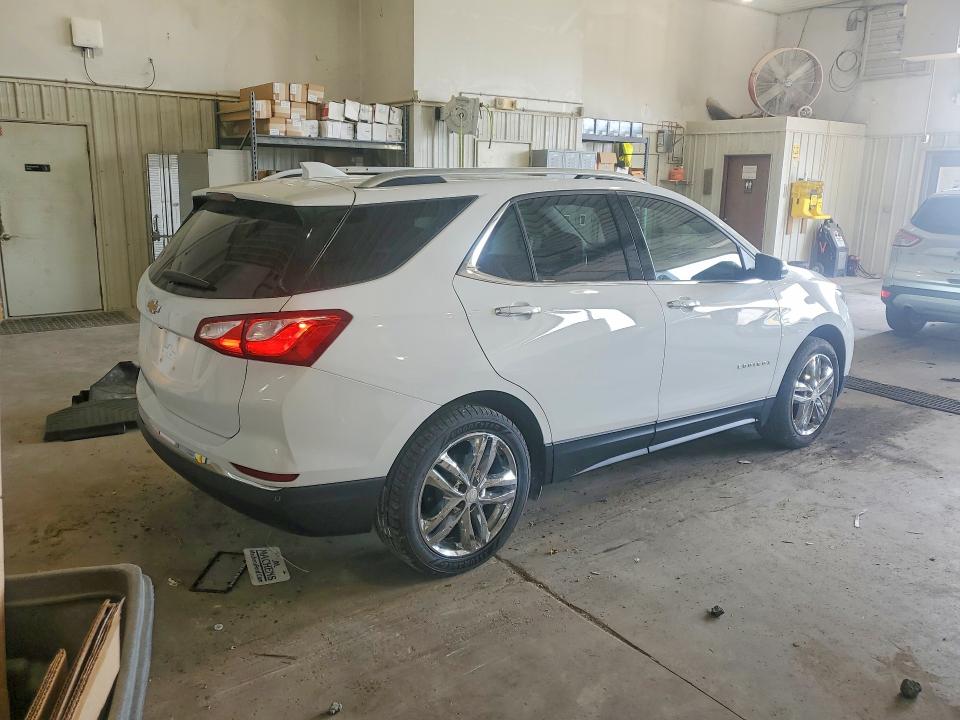Photo 3 from auction – 2021 CHEVROLET EQUINOX with VIN 3GNAXXEV0MS111134