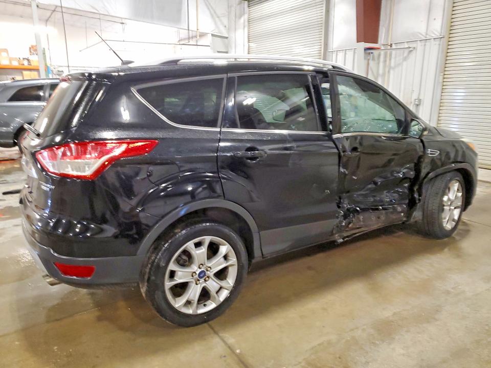 Photo 3 from auction – 2016 FORD ESCAPE with VIN 1FMCU9JX4GUA98658