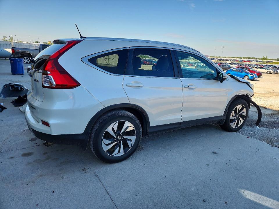 Photo 3 from auction – 2015 HONDA CR-V with VIN 5J6RM4H92FL005143