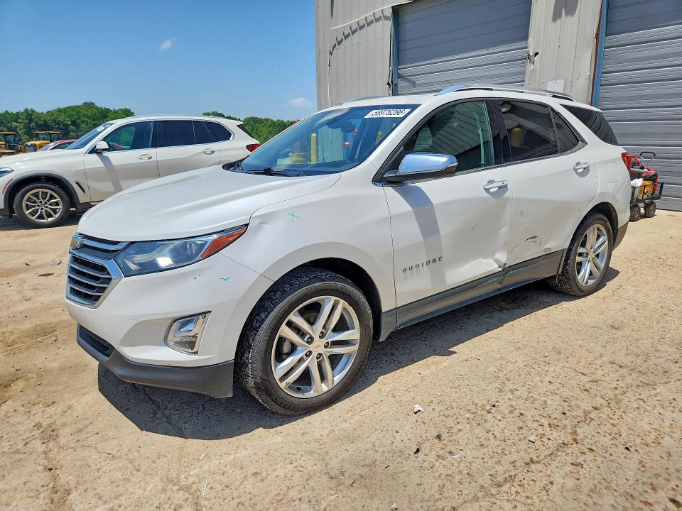 CHEVROLET EQUINOX 2018 with VIN 2GNAXMEV7J6110734 - Photo from auction