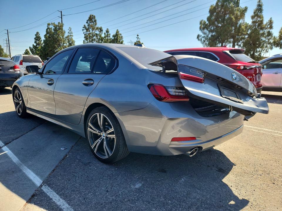 Photo 2 from auction – 2023 BMW 330I with VIN 3MW69FF01P8D41138