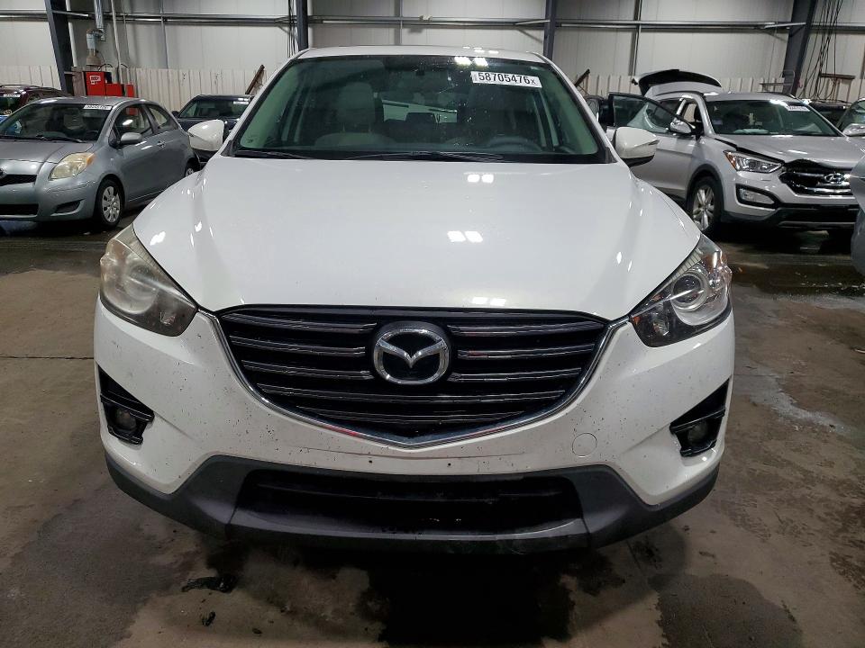 Photo 5 from auction – 2016 MAZDA CX-5 with VIN JM3KE4CY0G0902295