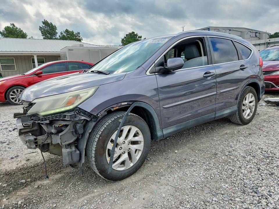 Photo 1 from auction – 2015 HONDA CR-V with VIN 2HKRM3H70FH518801