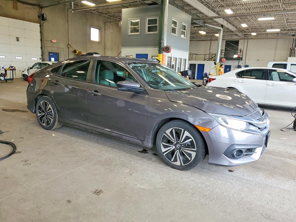Photo 4 from auction – 2016 HONDA CIVIC with VIN 19XFC1F31GE012104
