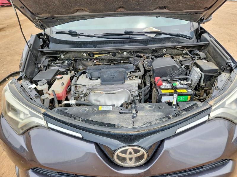 Photo 11 from auction – 2016 TOYOTA RAV4 with VIN JTMDFREV0GJ058722