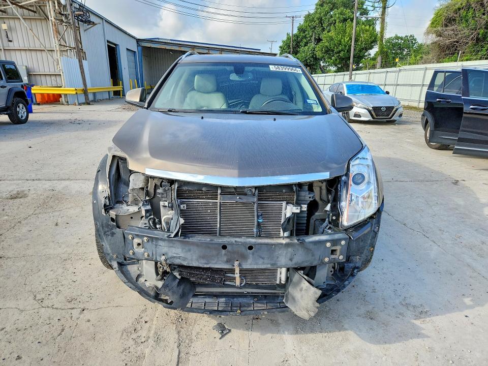Photo 5 from auction – 2014 CADILLAC SRX with VIN 3GYFNBE31ES564924