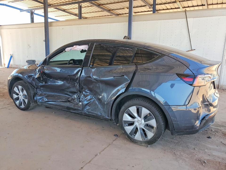 Photo 2 from auction – 2022 TESLA MODEL Y with VIN 7SAYGDEE9NA015423