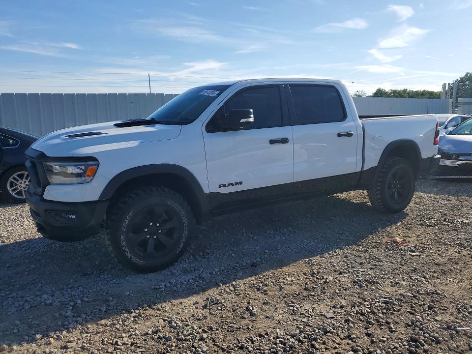 RAM 1500 2021 with VIN 1C6SRFLTXMN619695 - Photo from auction