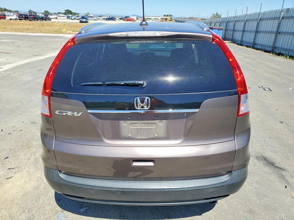 Photo 6 from auction – 2014 HONDA CR-V with VIN 2HKRM3H71EH556794