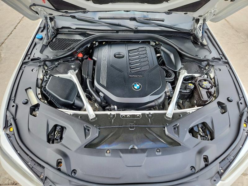 Photo 11 from auction – 2022 BMW 840I with VIN WBAGV2C02NCH16556