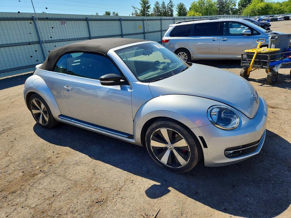Photo 4 from auction – 2013 VOLKSWAGEN BEETLE with VIN 3VW8A7AT1DM812697