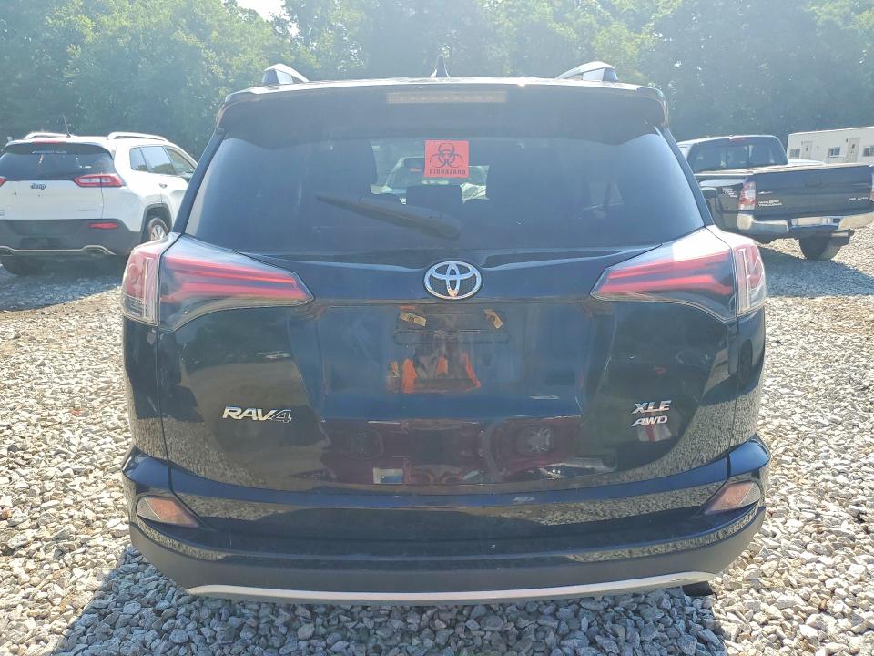Photo 6 from auction – 2016 TOYOTA RAV4 with VIN 2T3RFREV9GW459869