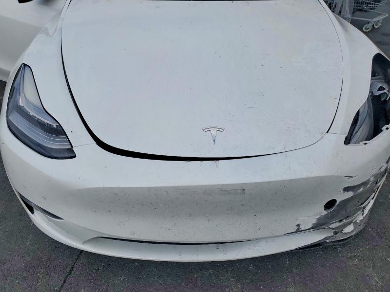 Photo 11 from auction – 2021 TESLA MODEL Y with VIN 5YJYGAEE2MF155021