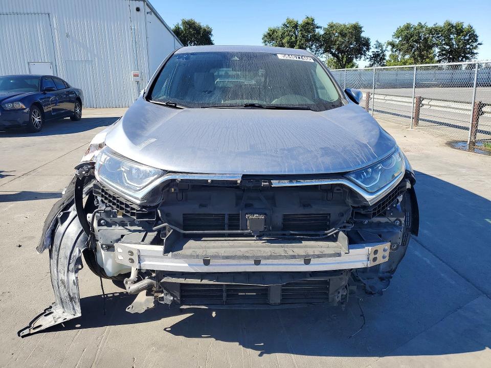 Photo 5 from auction – 2018 HONDA CR-V with VIN 7FARW1H58JE005126