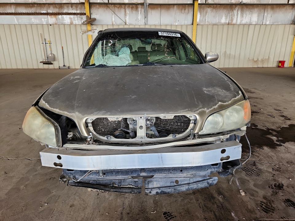Photo 5 from auction – 2002 INFINITI I35 with VIN JNKDA31A52T009753