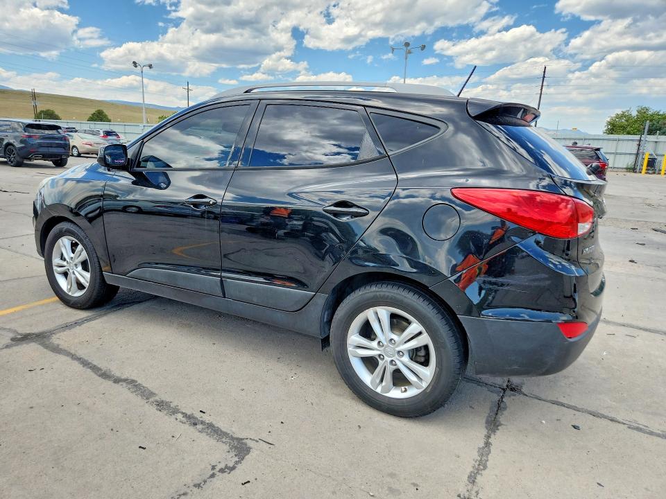 Photo 2 from auction – 2011 HYUNDAI TUCSON with VIN KM8JUCAC0BU257511
