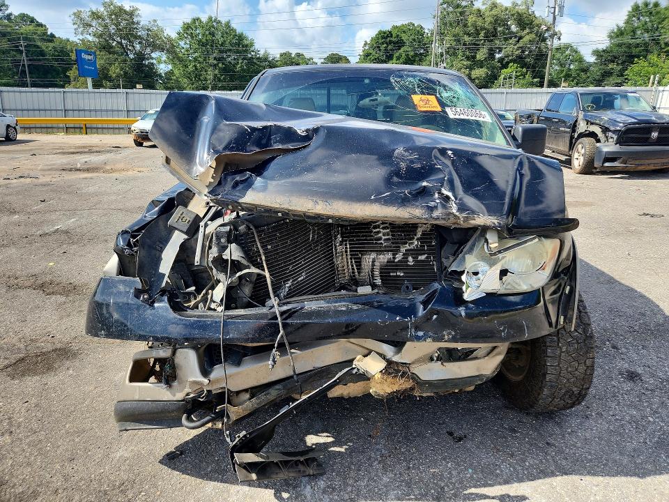Photo 5 from auction – 2004 FORD F150 with VIN 1FTPW14584KC97697