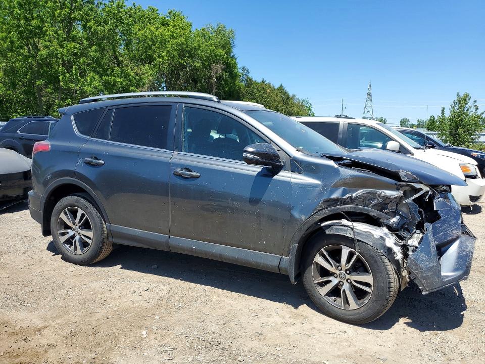 Photo 4 from auction – 2018 TOYOTA RAV4 with VIN 2T3BFREV8JW778026