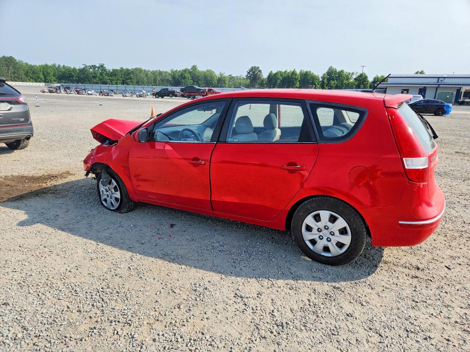 Photo 2 from auction – 2010 HYUNDAI ELANTRA TOURING with VIN KMHDB8AE2AU085529