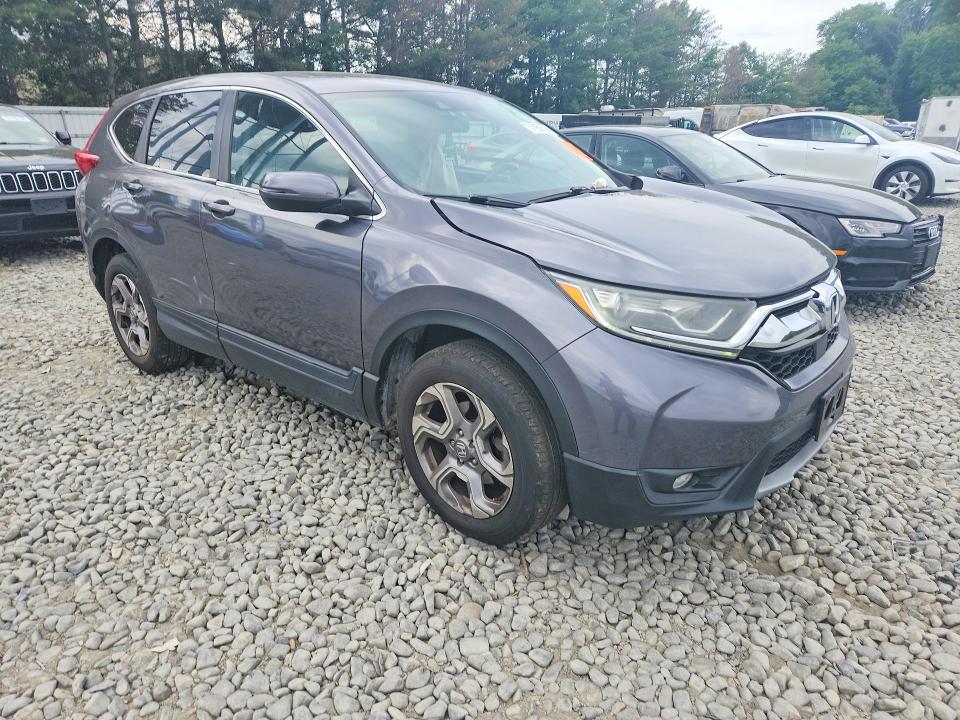 Photo 4 from auction – 2018 HONDA CR-V with VIN 2HKRW2H80JH675265