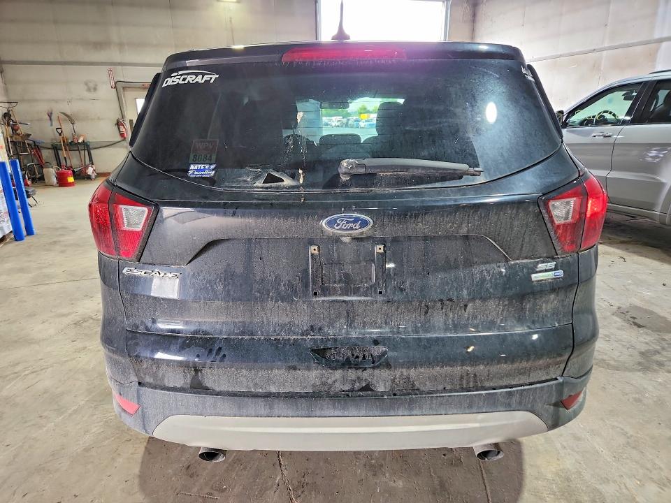 Photo 6 from auction – 2019 FORD ESCAPE with VIN 1FMCU9GD4KUB38114