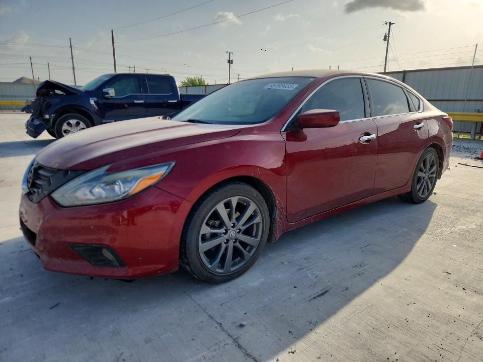 NISSAN ALTIMA 2018 with VIN 1N4AL3AP4JC291407 - Photo from auction