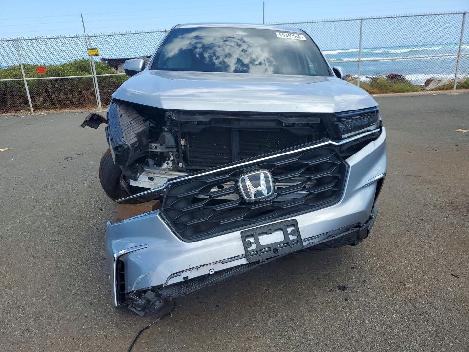 Photo 5 from auction – 2023 HONDA PILOT with VIN 5FNYG2H40PB008032
