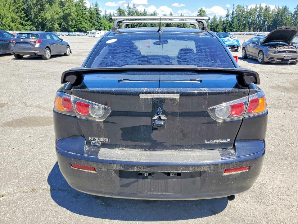 Foto 6 de la subasta – 2014 MITSUBISHI LANCER con VIN JA32V2FW8EU018729
