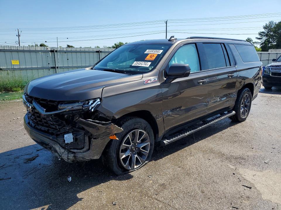 CHEVROLET SUBURBAN 2021 with VIN 1GNSKDKD3MR175653 - Photo from auction