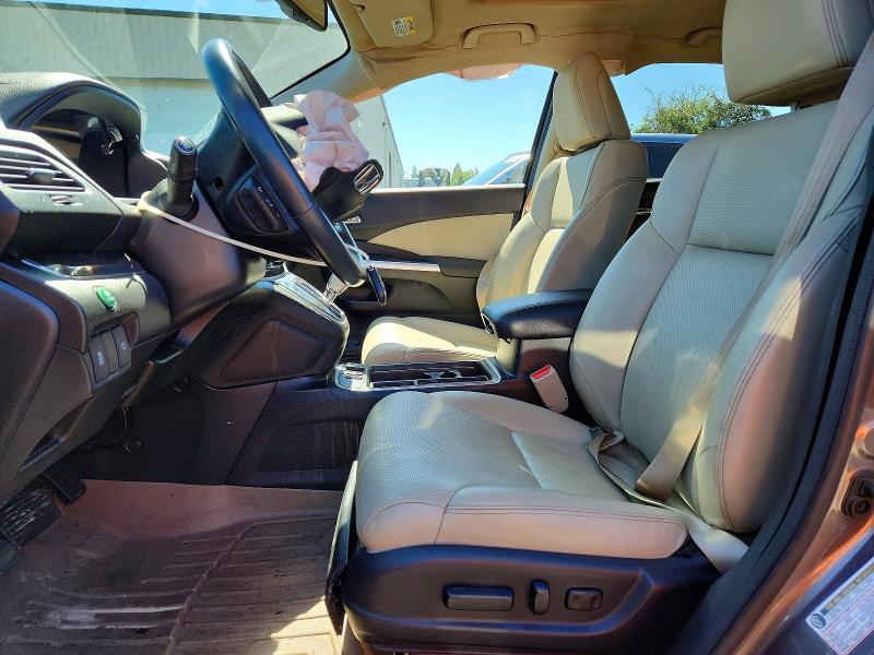 Photo 7 from auction – 2015 HONDA CR-V with VIN 2HKRM4H77FH611305