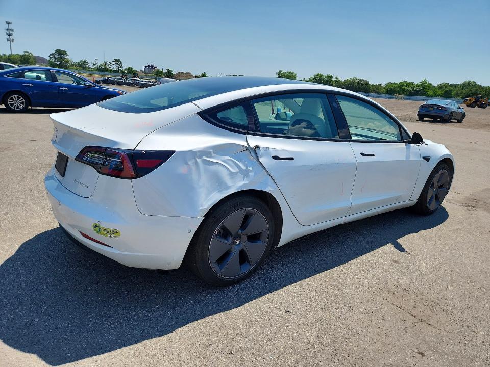 Photo 3 from auction – 2022 TESLA MODEL 3 with VIN 5YJ3E1EB2NF176975