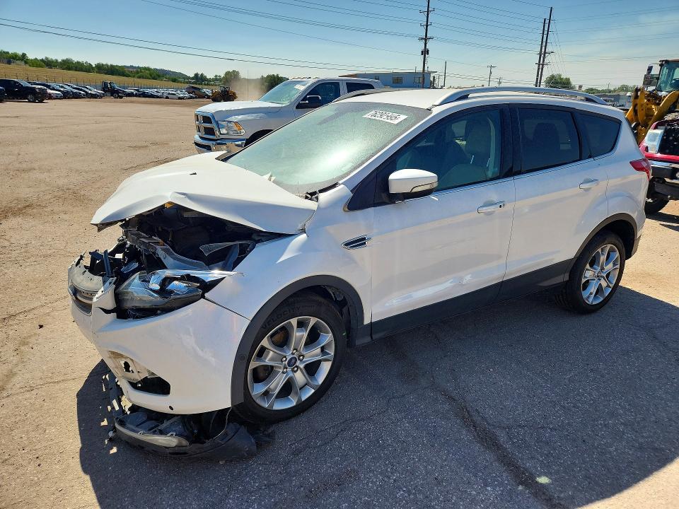 FORD ESCAPE 2014 with VIN 1FMCU0JX2EUE50435 - Photo from auction