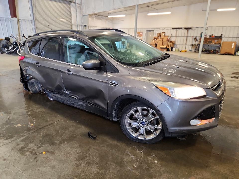 Photo 4 from auction – 2014 FORD ESCAPE with VIN 1FMCU9G99EUC30495