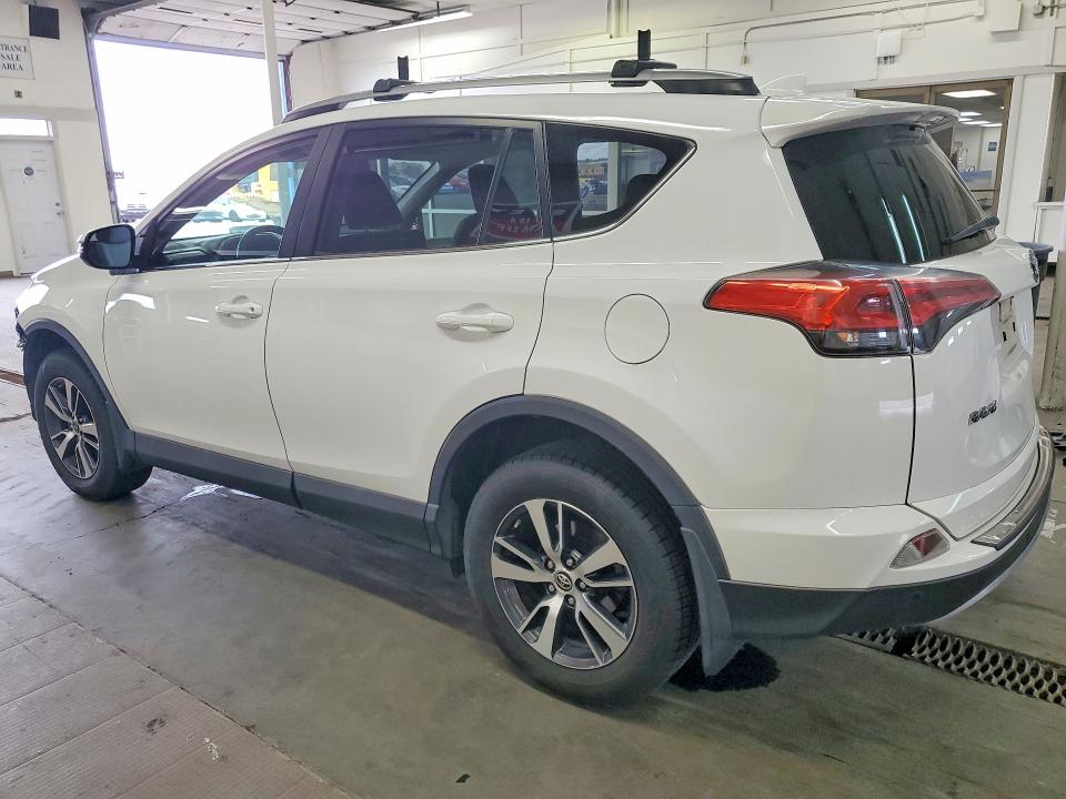 Photo 2 from auction – 2018 TOYOTA RAV4 with VIN 2T3RFREV5JW838052