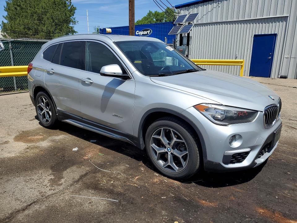 Photo 4 from auction – 2018 BMW X1 with VIN WBXHT3C38J5F93201