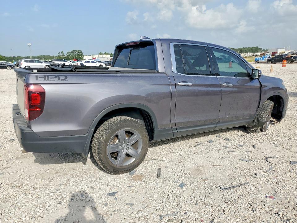 Photo 3 from auction – 2021 HONDA RIDGELINE with VIN 5FPYK3F76MB005575